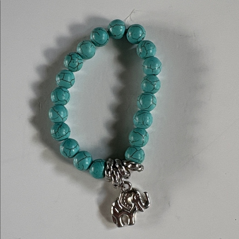 Faux Turquoise colored Beaded Bracelet with Elephant Charm